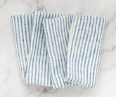 Washed napkins hanging to dry, emphasizing reusability and low-maintenance care