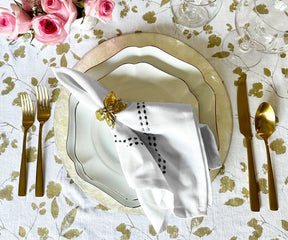 Cloth dinner napkins, such as cotton ones, can be elegantly folded using various techniques. Vanity Fair offers high-quality dinner napkins, and for a personalized touch, you can opt for monogrammed dinner napkins.