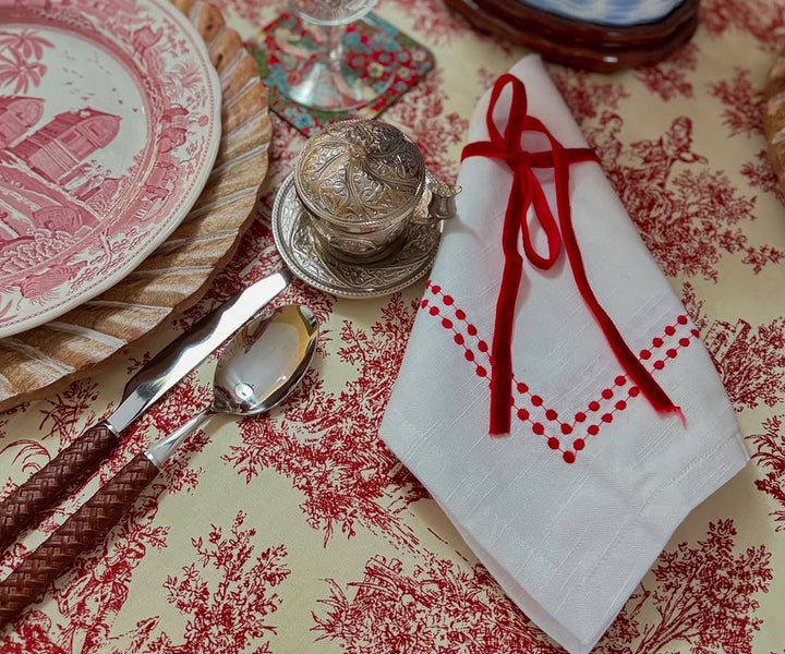 White cotton napkin with red dot embroidery