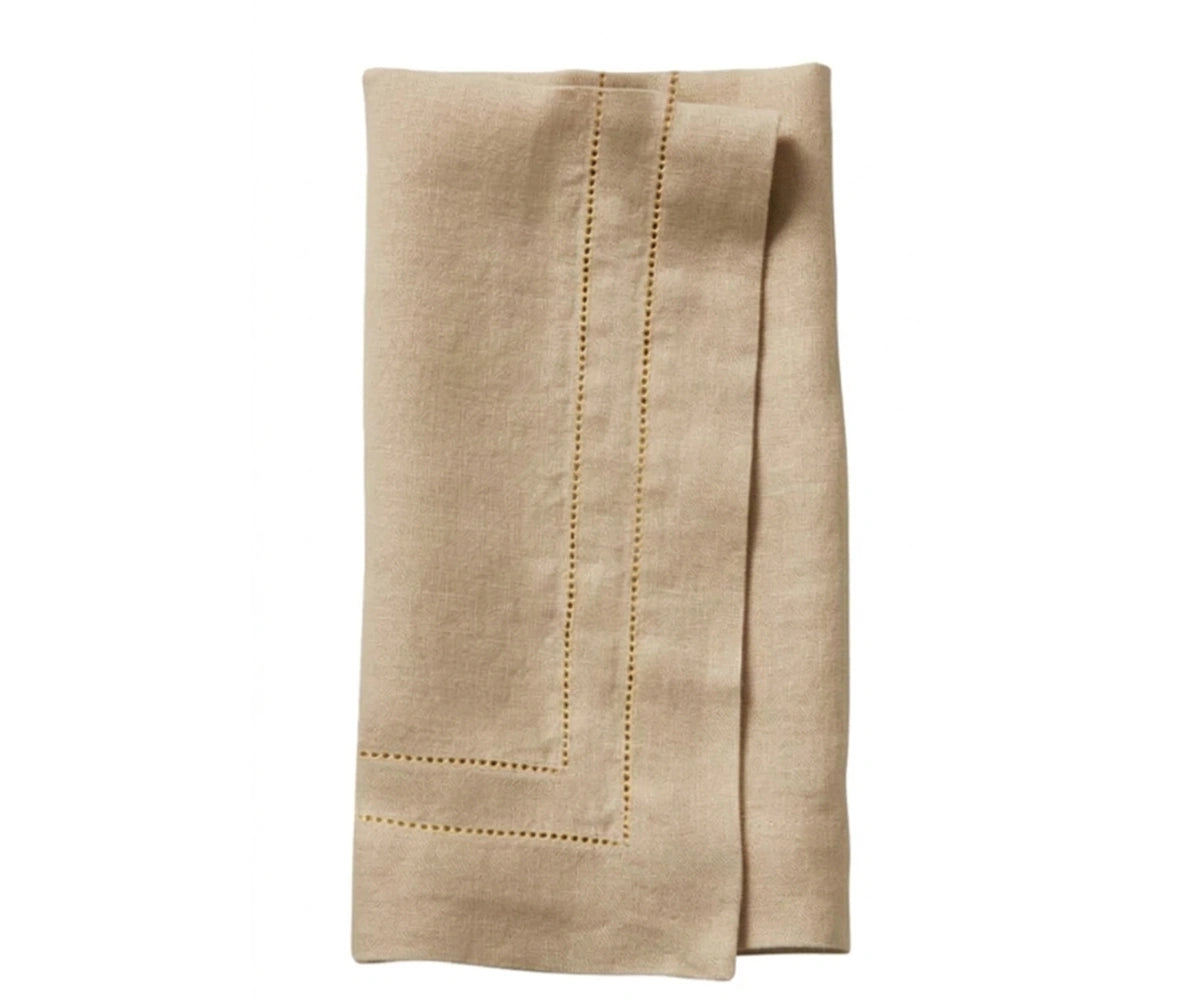 Beige hemstitch cotton napkins set on an elegant dining table, reusable cloth dinner napkins for weddings, parties, and farmhouse decor