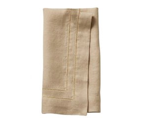 Beige hemstitch cotton napkins set on an elegant dining table, reusable cloth dinner napkins for weddings, parties, and farmhouse decor