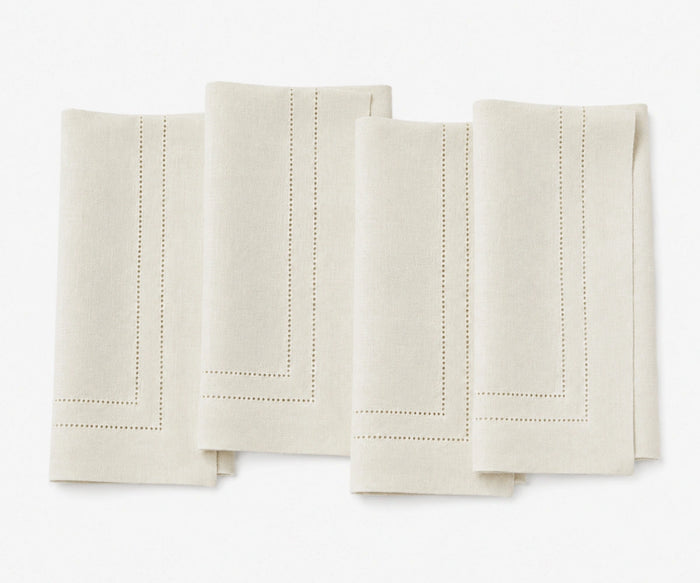 ivory linen napkins with double hemstitch, premium cloth dinner napkins for weddings, formal dining, and everyday table settings.