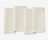 ivory linen napkins with double hemstitch, premium cloth dinner napkins for weddings, formal dining, and everyday table settings.
