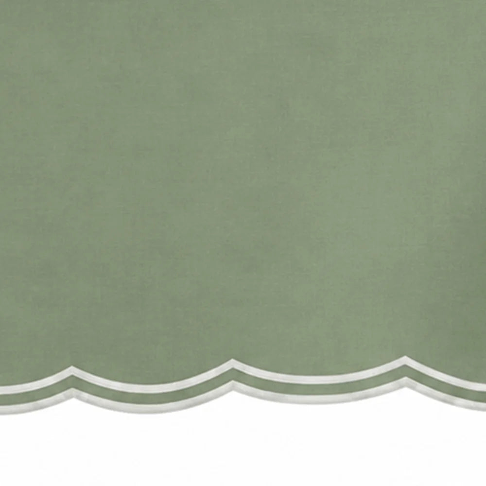 Sage green rectangular tablecloth with white embroidered border for elegant table settings