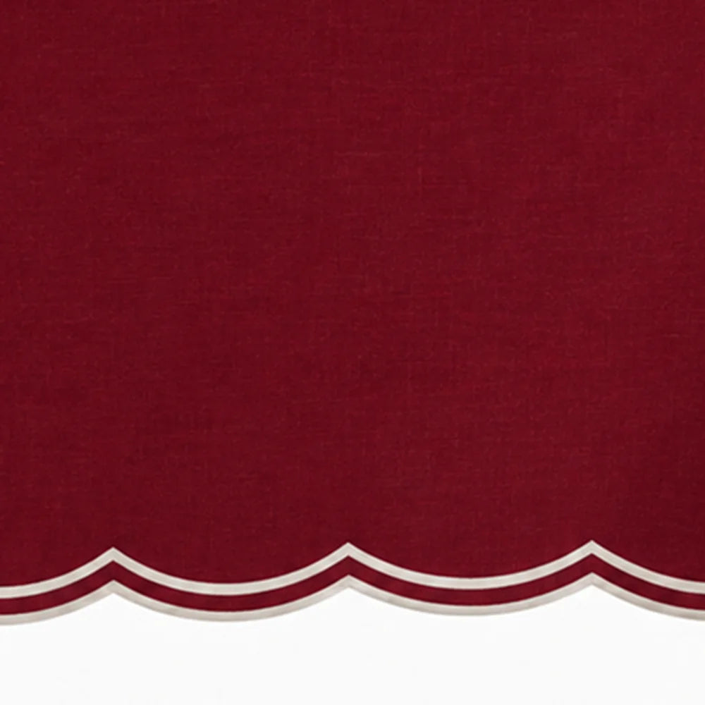 Elegant burgundy embroidered cotton tablecloth with white scalloped detailing for dining rooms