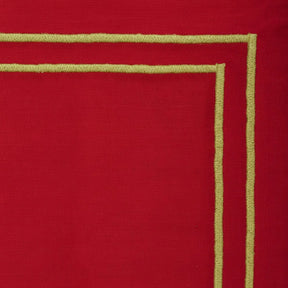 Red reusable cotton napkins with gold edging, folded set