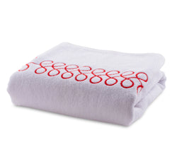 White embroidered cotton bath towel with red design, 30x60 inches, soft and absorbent.