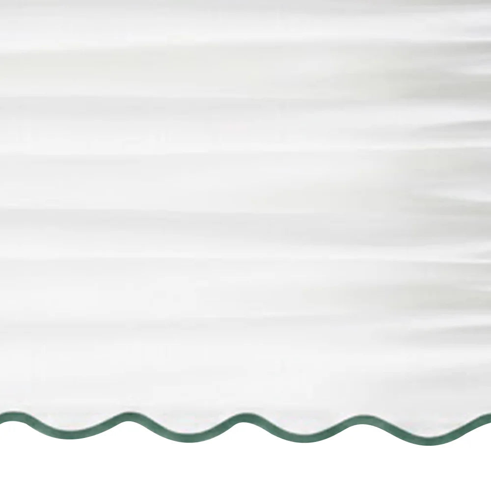 White scalloped curtain panel with green trim - Close up
