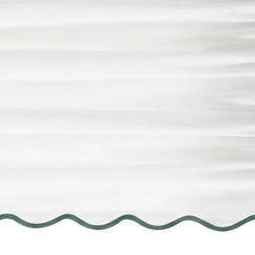 White scalloped curtain panel with green trim - Close up