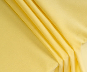 Soft fabric rectangle tablecloth in lemon yellow for kitchen or dining room