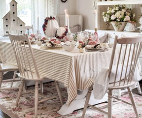 Rustic farmhouse ticking stripe tablecloth in beige and white