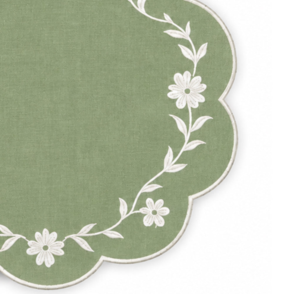 sage green scalloped placemat with white floral vine embroidery