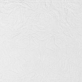 White quilted placemat color swatch in premium quilt cotton featuring a classic floral quilted design for dining tables.