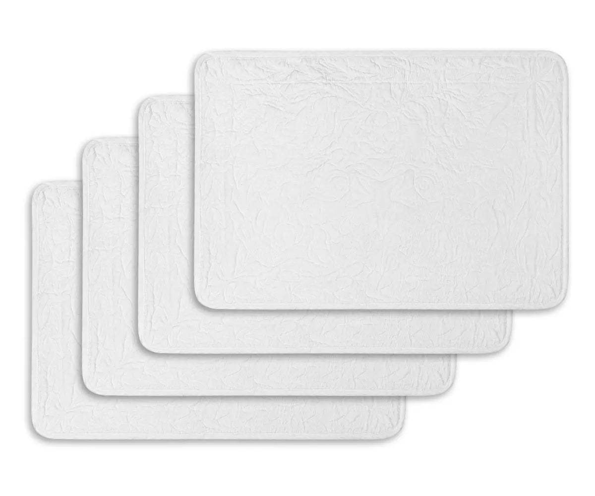 White quilted placemat featuring a floral quilted pattern in premium quilt cotton, reusable rectangle placemat for farmhouse and modern table settings.