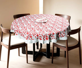 Round farmhouse-style tablecloth with rich red floral pattern