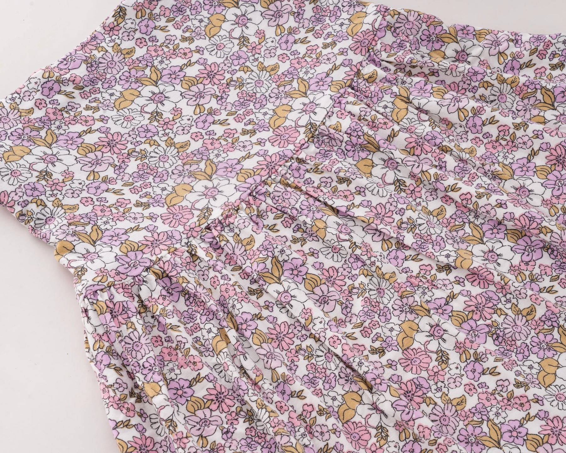 Adorable toddler girl floral dress – light pink cotton summer dress with gathered waist and twirl-worthy pleats.