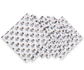 Set of three floral-patterned napkins on a white background