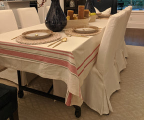 Cotton tablecloth - Dining room table with a French tablecloth and a vase as centerpiece