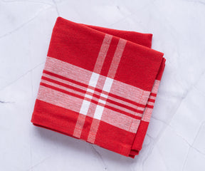 Farmhouse kitchen towel with a classic red and white checkered pattern