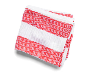 Hanging kitchen towels with decorative patterns for added charm.