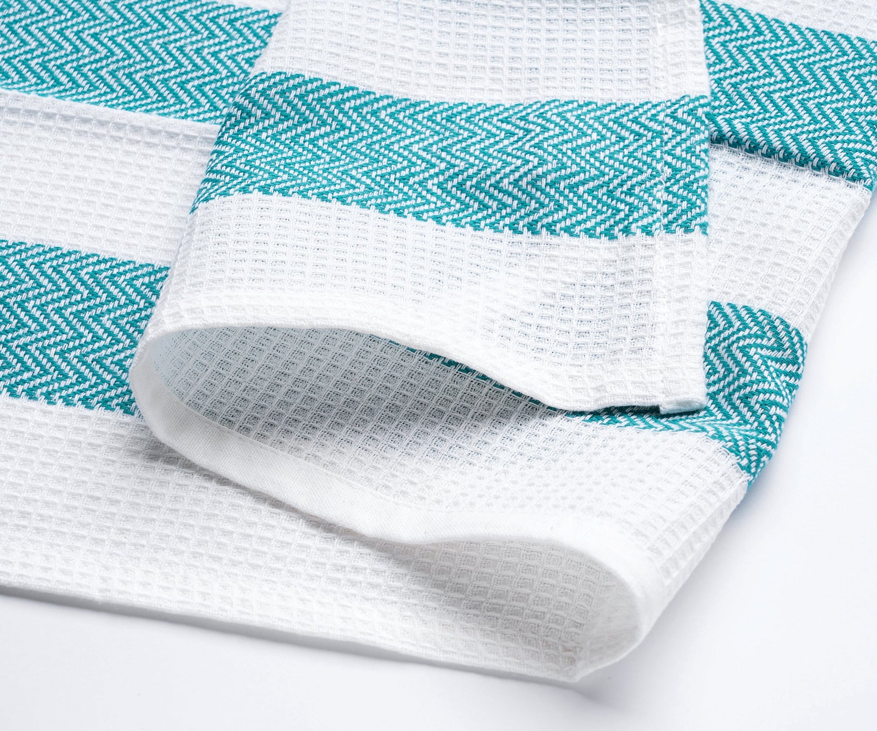 Luxury towels with striped patterns, offering comfort and style.