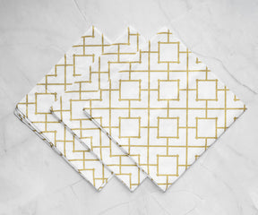 linen white napkins elegantly folded into intricate designs add a touch of class to any table.