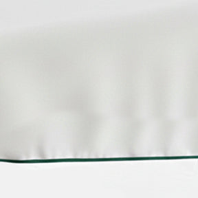 White cotton tablecloth with green piping trim