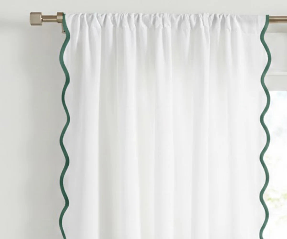 White scalloped curtain panel with emerald green trim