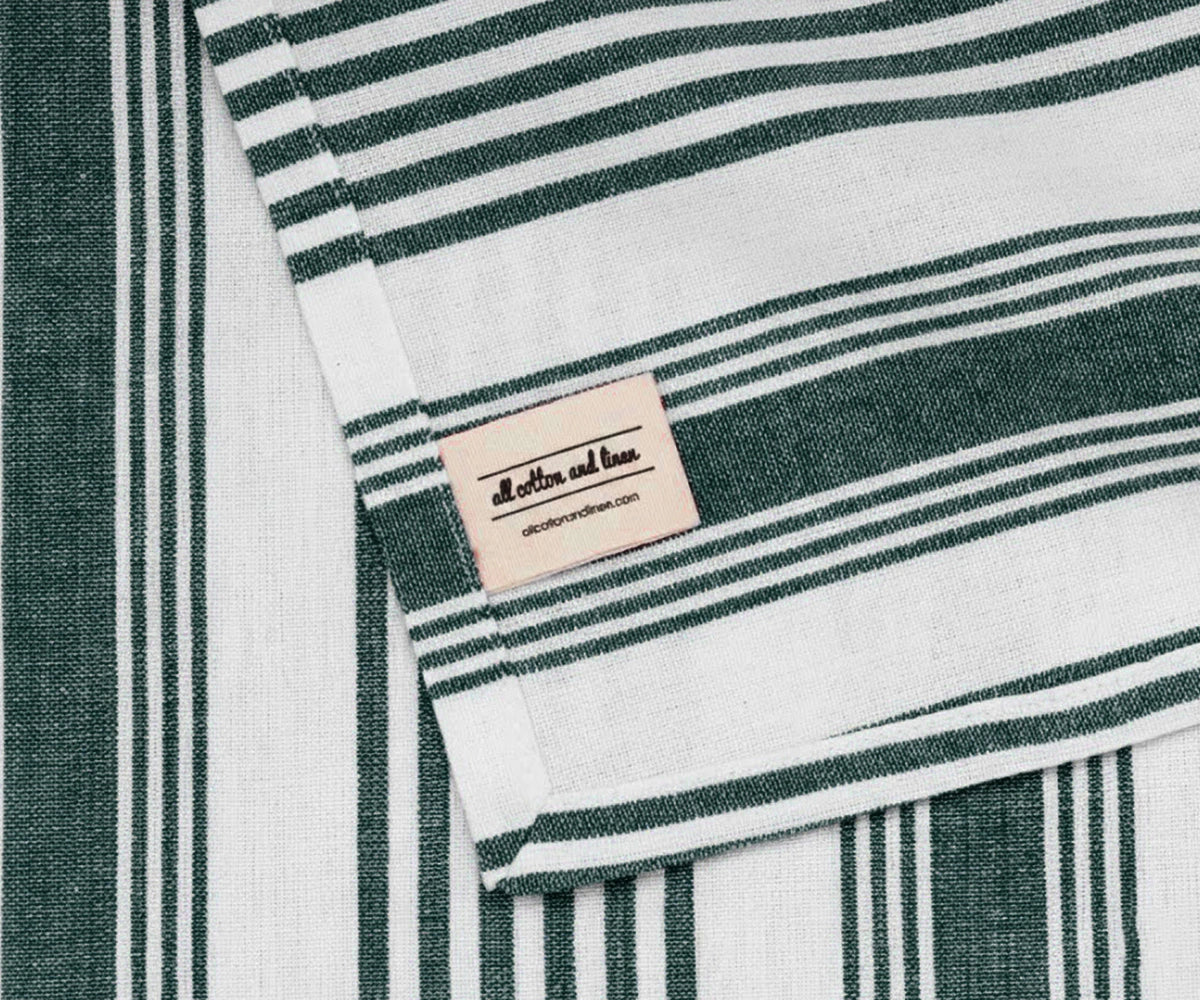 Green striped cotton napkin with label detail