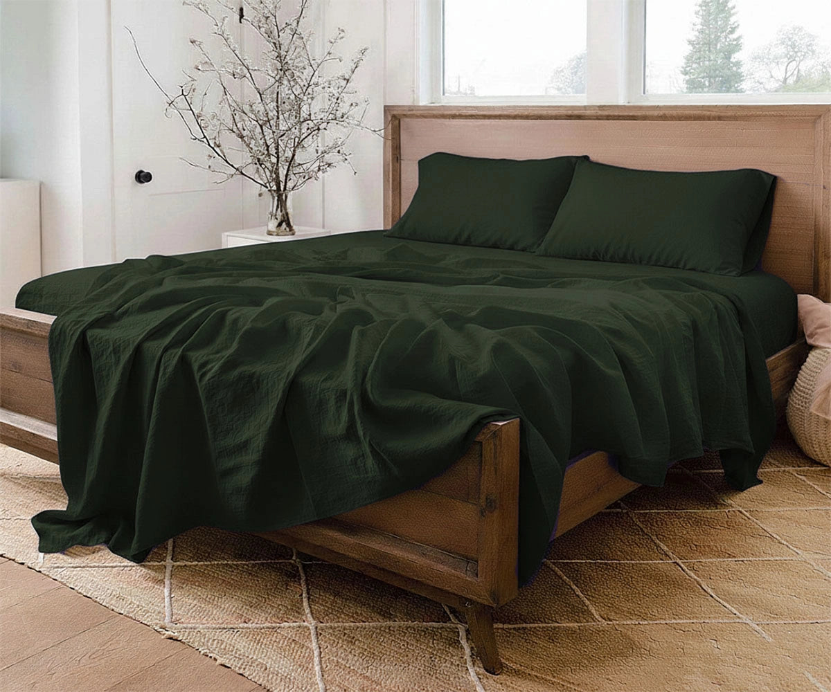 Green linen bed sheet set crafted from premium 100% linen for year-round comfort. Deep pocket king and queen luxury linen bedding set for nature-inspired bedroom décor.