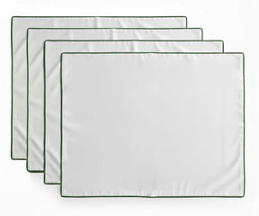 White cotton placemat with green trim