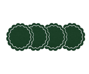 Round placemats made from 100% cotton with an elegant scalloped border and embroidered accents