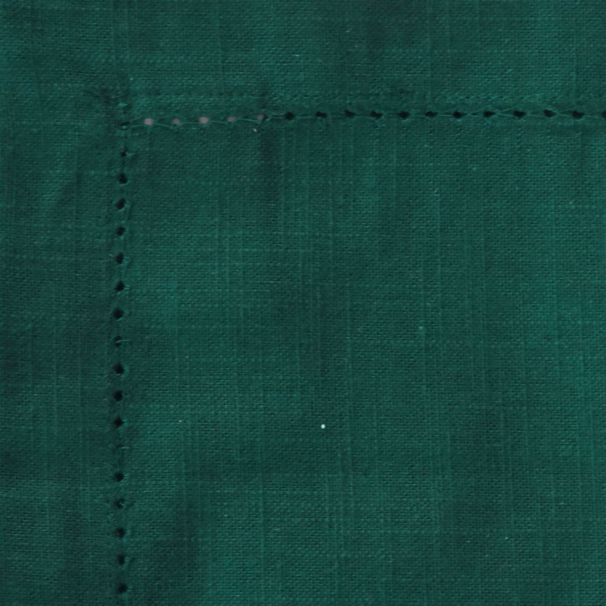 Green cloth dinner napkin with single hemstitch border – eco-friendly cotton napkin for home and restaurant use.