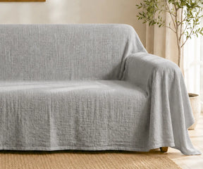 Natural linen sofa cover designed for everyday use with a soft texture and washable fabric.