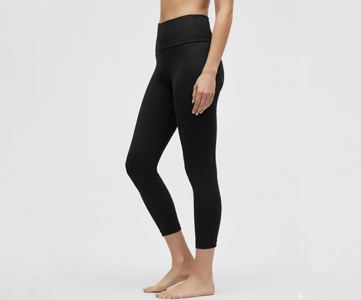 Women's everyday gym leggings in black, high-rise fit with moisture-wicking, lightweight fabric ideal for yoga, fitness, or casual outfits.