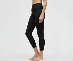 Women's everyday gym leggings in black, high-rise fit with moisture-wicking, lightweight fabric ideal for yoga, fitness, or casual outfits.