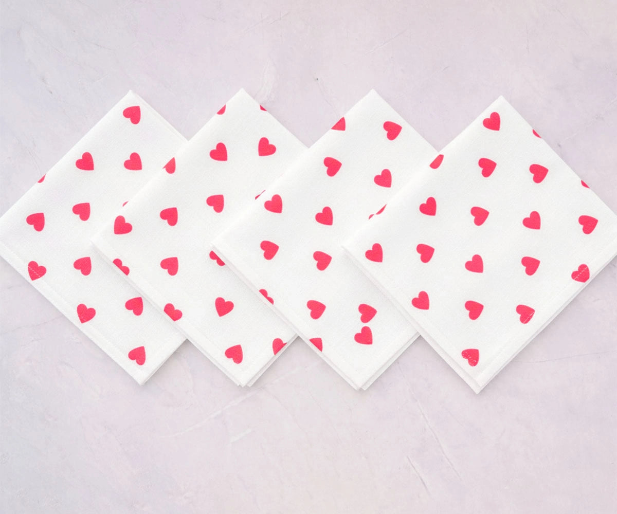 Blush pink heart embroidered cotton napkins for modern dining tables and love-themed celebrations