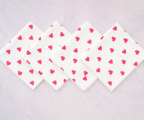 Blush pink heart embroidered cotton napkins for modern dining tables and love-themed celebrations