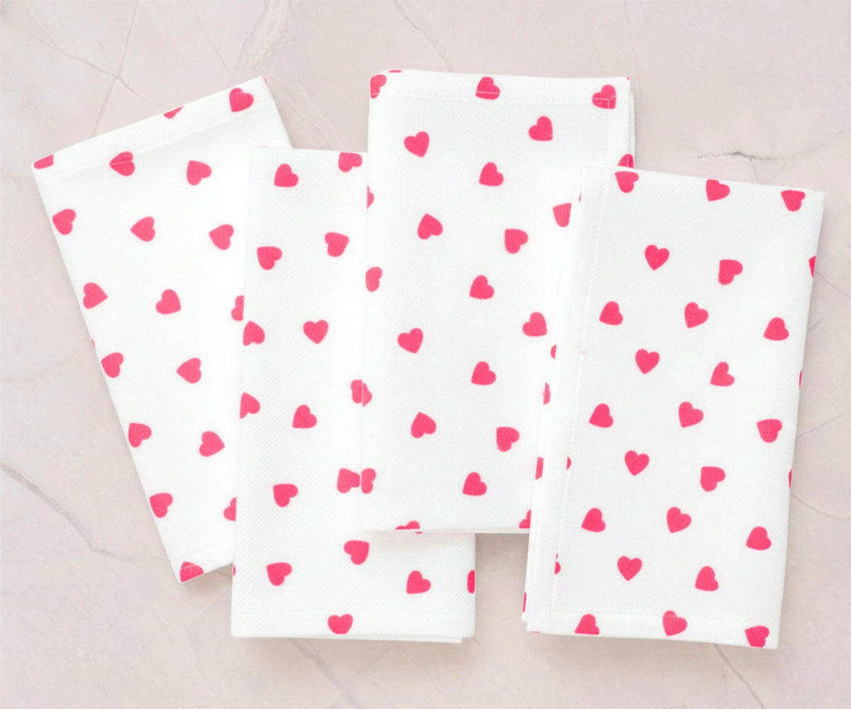 Blush pink heart embroidered cotton napkins for modern Valentine’s tables and cozy dining décor