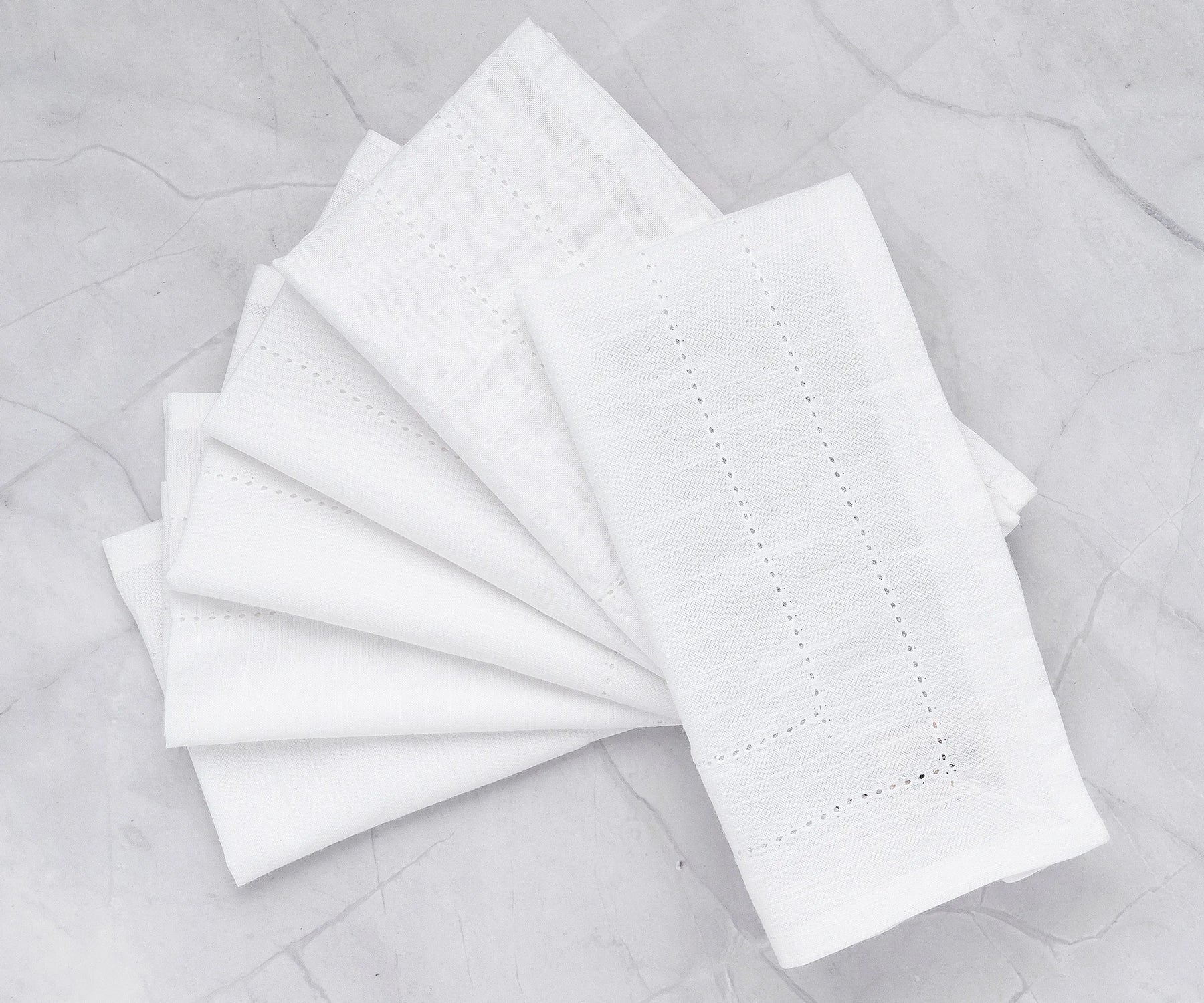 Elegant 20x20 cotton napkins folded for formal table setting