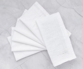 Elegant 20x20 cotton napkins folded for formal table setting