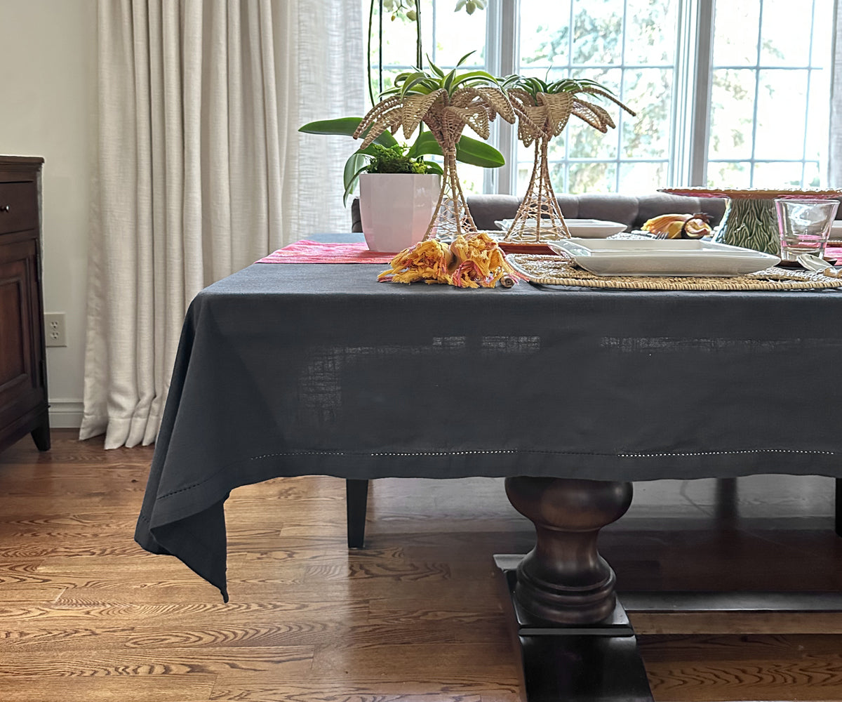 "Elevate with gray, embrace spring's liveliness, and celebrate holidays with our versatile tablecloth assortment."
