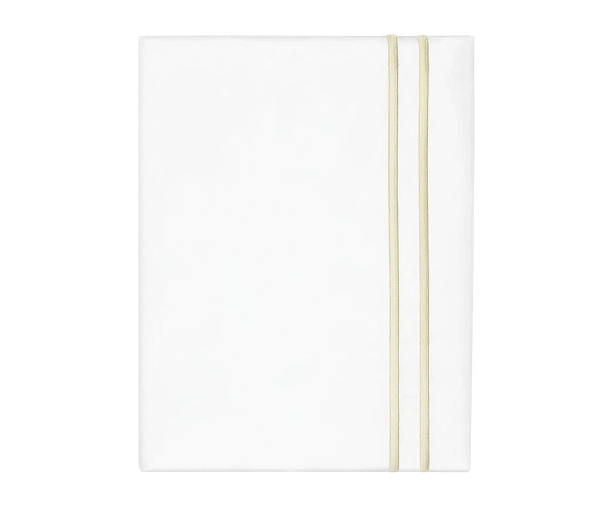 Neatly folded white cotton flat sheet accented with a subtle ivory double-line embroidered border.