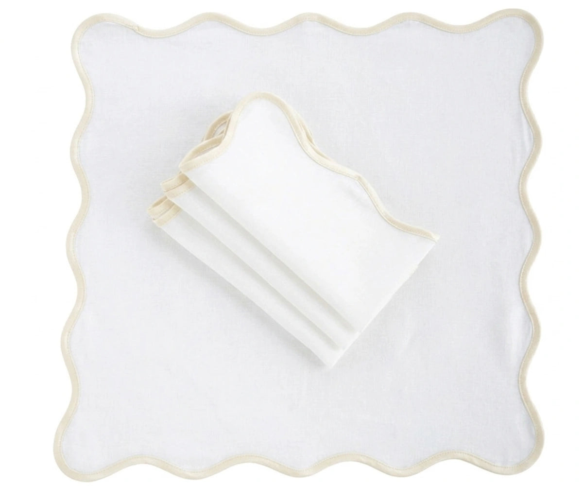 Reusable ivory cotton scalloped napkins for Thanksgiving tables, Christmas dinners, bridal showers, and modern elegant dining room table settings.