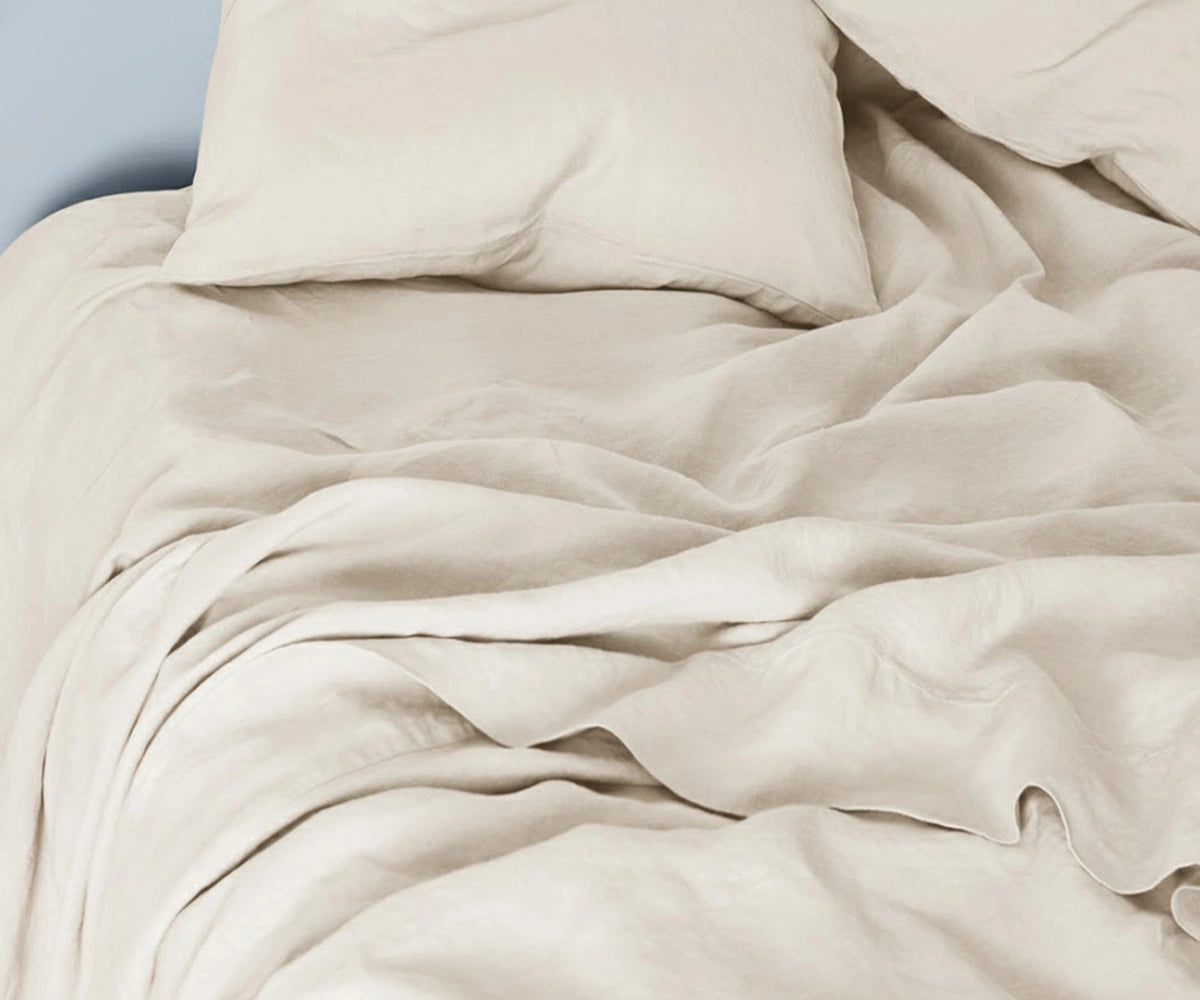 Ivory linen bedding set made from 100% natural linen, offering a clean, classic, and elegant bedroom aesthetic.