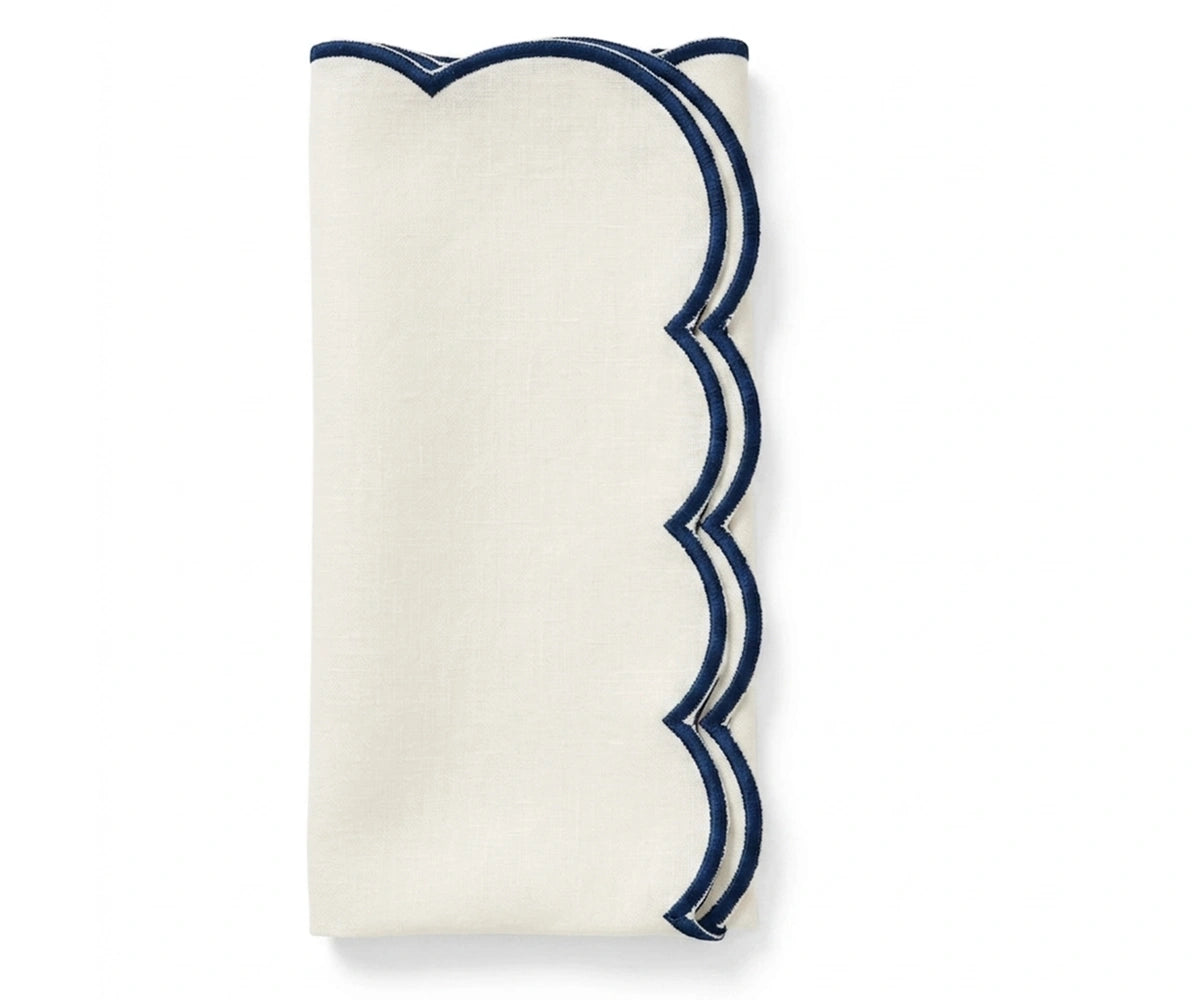 Ivory scalloped edge cotton napkins with navy blue trim for elegant dining tables, reusable cloth napkins for weddings and formal dinner parties