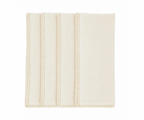 Ivory cloth napkins with decorative pom pom border, premium cotton dinner napkins for bridal showers, baby showers, wedding receptions, festive entertaining, and neutral farmhouse table décor.