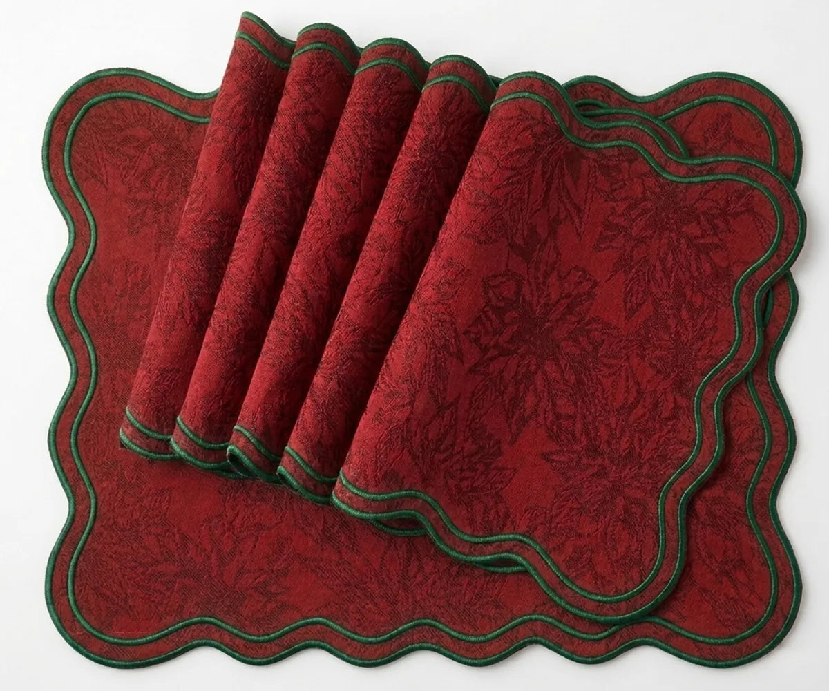 Textured cotton jacquard scalloped placemats with green edge for festive dining and holiday décor
