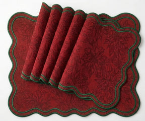 Textured cotton jacquard scalloped placemats with green edge for festive dining and holiday décor