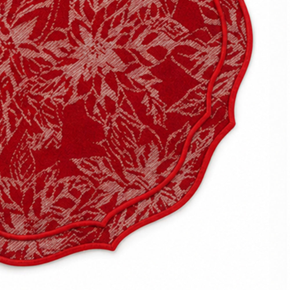 Detailed fabric swatch of cotton jacquard damask weave with textured floral pattern and decorative red scalloped border, showcasing craftsmanship and quality.